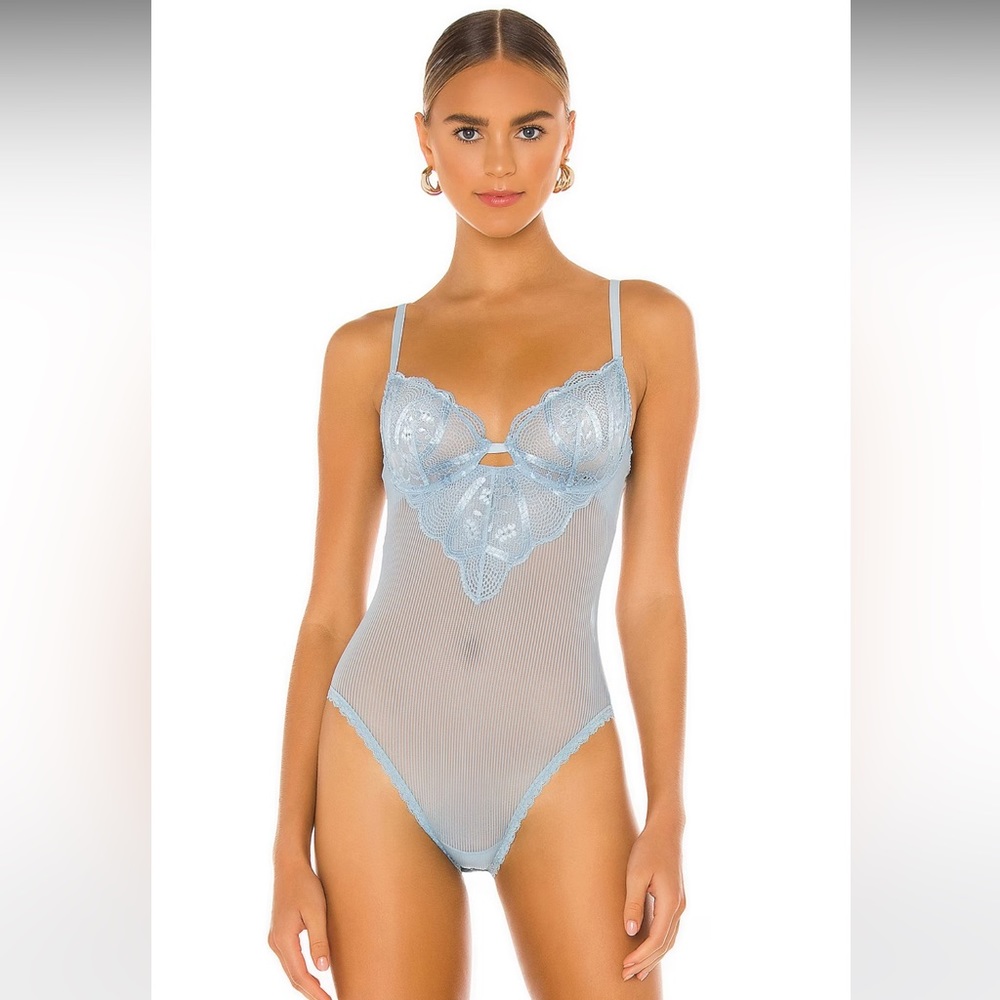 Powder blue sheer body suit never worn size S